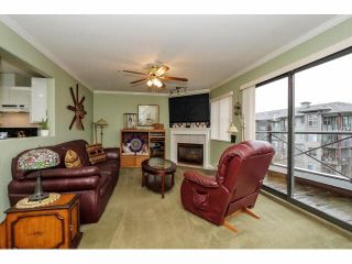 Photo 4: 406 2357 WHYTE Avenue in Port Coquitlam: Central Pt Coquitlam Condo for sale in "RIVERSIDE PLACE" : MLS®# V1100812