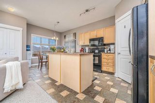 Photo 8: 78 Cougartown Circle SW in Calgary: Cougar Ridge Detached for sale : MLS®# A2141592