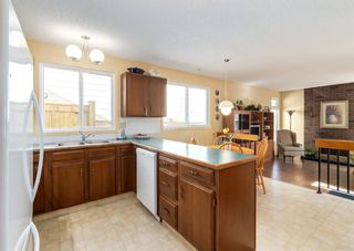 Photo 8: 84 Strathcona Close SW in Calgary: Strathcona Park Detached for sale : MLS®# A1203602