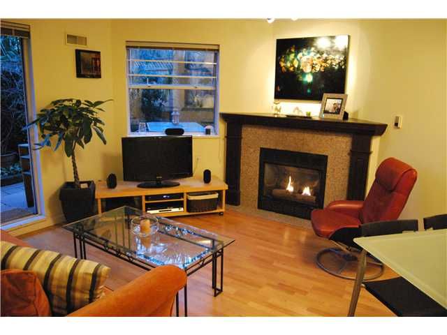 Main Photo: 103 1959 W 2ND Avenue in Vancouver: Kitsilano Condo for sale in "CARMEL PLACE" (Vancouver West)  : MLS®# V887006