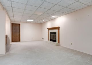 Photo 19: 152 Oakbriar Close SW in Calgary: Palliser Semi Detached (Half Duplex) for sale : MLS®# A2044910