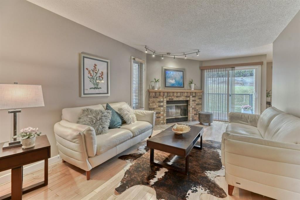 Main Photo: 85 Coachway Gardens SW in Calgary: Coach Hill Row/Townhouse for sale : MLS®# A1110212
