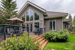 Photo 4: 10 Slopeview Drive SW in Calgary: Springbank Hill Detached for sale : MLS®# A2065714