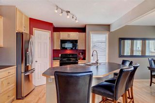 Photo 8: 51 COVECREEK Place NE in Calgary: Coventry Hills House for sale : MLS®# C4124271