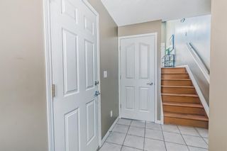 Photo 4: 395 Northmount Drive NW in Calgary: Highwood Row/Townhouse for sale : MLS®# A2031805