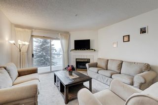 Photo 3: 216 33 Arbour Grove Close NW in Calgary: Arbour Lake Apartment for sale : MLS®# A2031107