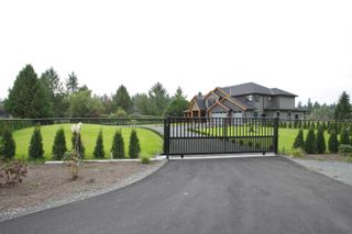Photo 1: 2341 208 Street in Langley: Brookswood Langley House for sale in "Brookswood/Fernridge" : MLS®# R2788686