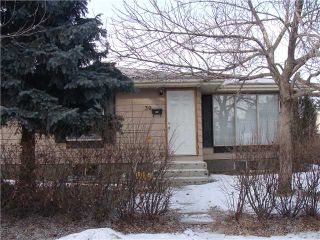 Photo 1: 30 ERIN RIDGE Place SE in CALGARY: Erinwoods Residential Detached Single Family for sale (Calgary)  : MLS®# C3602698
