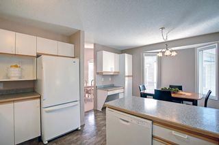 Photo 18: 297 Arbour Cliff Close NW in Calgary: Arbour Lake Semi Detached (Half Duplex) for sale : MLS®# A1255400