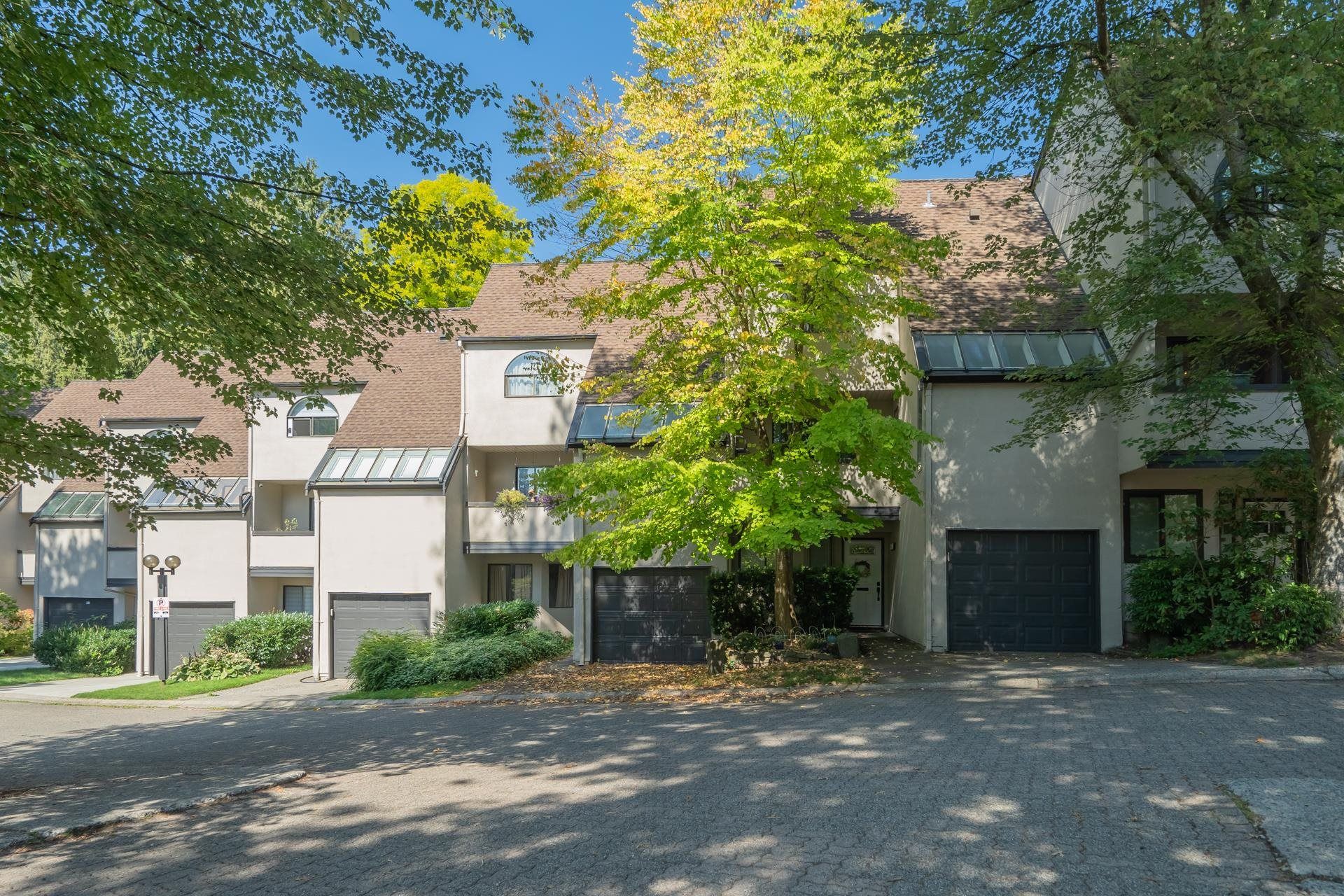 Main Photo: 8541 WOODTRAIL Place in Burnaby: Forest Hills BN Townhouse for sale in "SIMON FRASER VILLAGE" (Burnaby North)  : MLS®# R2811616