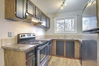 Photo 11: 161 7172 Coach Hill Road SW in Calgary: Coach Hill Row/Townhouse for sale : MLS®# A1101554