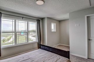 Photo 21: 249 Creekside Boulevard SW in Calgary: C-168 Semi Detached (Half Duplex) for sale : MLS®# A2136407
