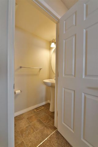 Photo 7: 104 Windstone Link SW: Airdrie Row/Townhouse for sale : MLS®# A1190179