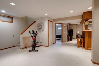 Photo 33: 56 Strathridge Close SW in Calgary: Strathcona Park Detached for sale : MLS®# A1245325