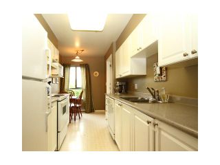 Photo 1: 310 223 MOUNTAIN Highway in North Vancouver: Lynnmour Condo for sale in "MOUNTAIN VIEW VILLAGE" : MLS®# V844629