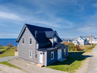 Photo 1: 2844 Main Street in Clark's Harbour: 407-Shelburne County Residential for sale (South Shore)  : MLS®# 202225220