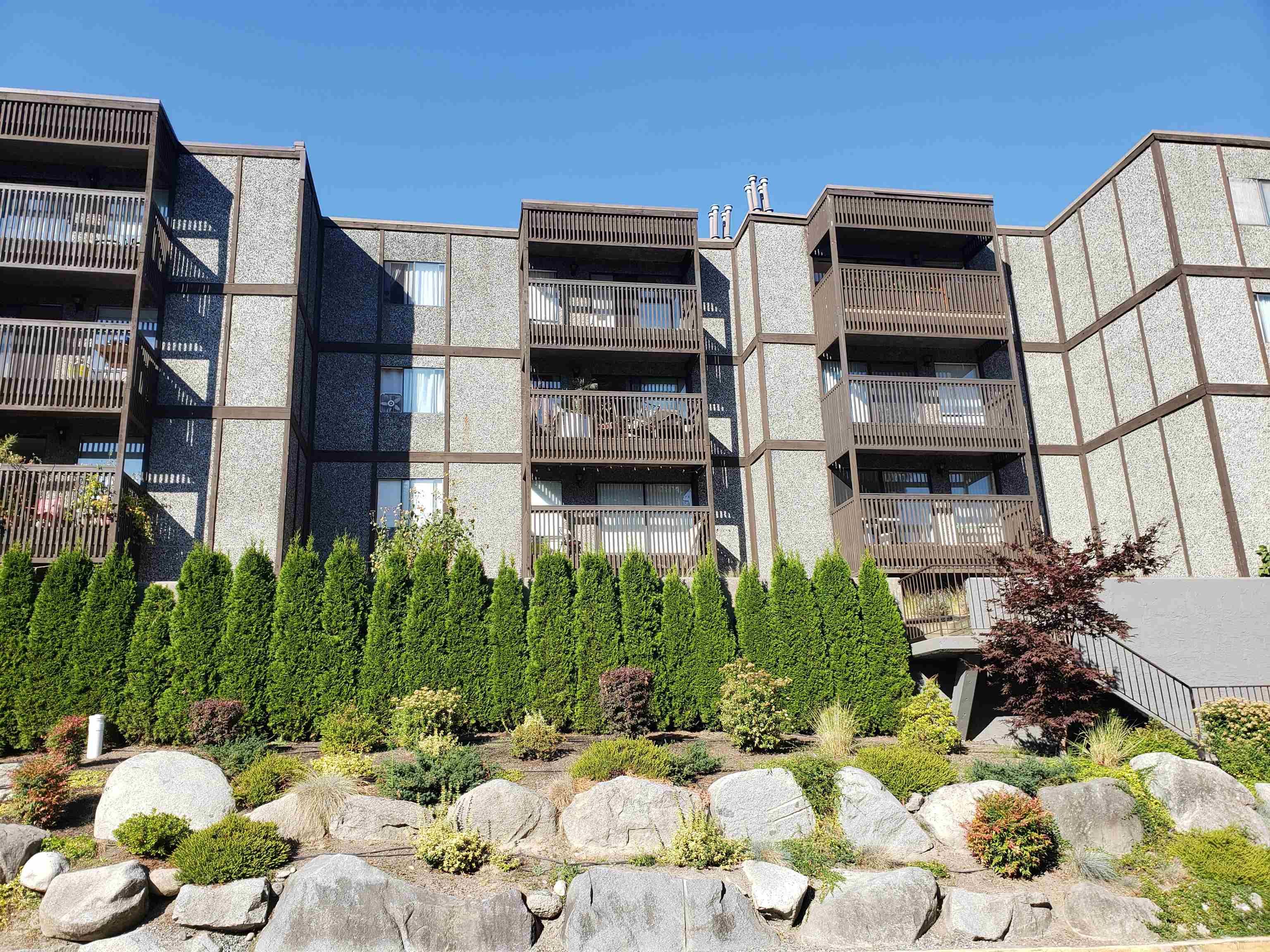 Main Photo: 410 9672 134 Street in Surrey: Whalley Condo for sale in "PARKWOODS - DOGWOOD" (North Surrey)  : MLS®# R2728146
