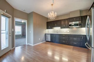 Photo 13: 110 305 1 Avenue NW: Airdrie Apartment for sale : MLS®# A1255700