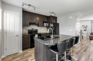 Photo 9: 34 Autumn Green SE in Calgary: Auburn Bay Semi Detached (Half Duplex) for sale : MLS®# A2036319