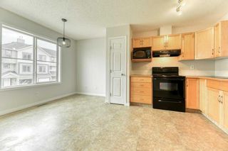 Photo 13: 156 Everhollow Heights SW in Calgary: Evergreen Row/Townhouse for sale : MLS®# A2123116