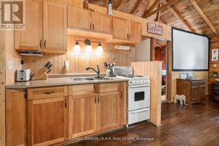 Photo 7: 75 MCGUIRE BEACH RD E in Kawartha Lakes: House for sale : MLS®# X6761436