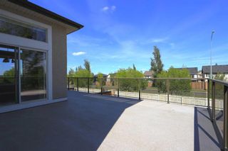 Photo 7: 376 Everbrook Way SW in Calgary: Evergreen Detached for sale : MLS®# A2116768