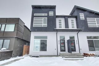 Photo 1: 2 1536 29 Avenue SW in Calgary: South Calgary Row/Townhouse for sale : MLS®# A2022018
