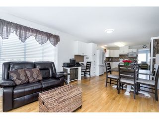 Photo 10: 34612 6TH Avenue in Abbotsford: Poplar House for sale in "Huntington Village" : MLS®# R2568891