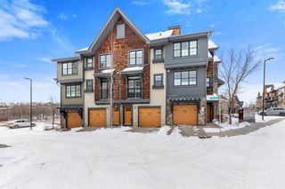 Photo 1: 105 Ascot Manor SW in Calgary: Aspen Woods Row/Townhouse for sale : MLS®# A1185587