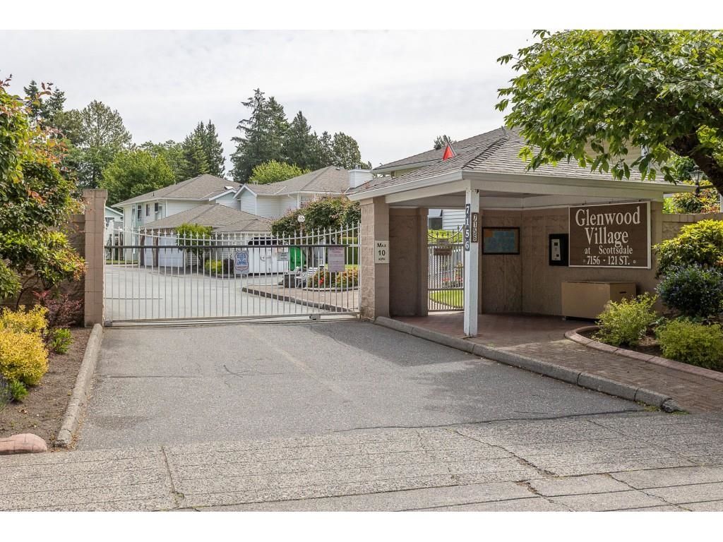 Main Photo: 214 7156 121 Street in Surrey: West Newton Townhouse for sale in "Glenwood Village" : MLS®# R2642037
