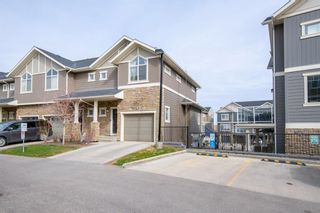 Photo 2: 558 Evanston Manor NW in Calgary: Evanston Row/Townhouse for sale : MLS®# A1212914