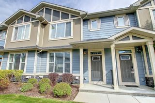 Photo 1: 236 Panatella Walk NW in Calgary: Panorama Hills Row/Townhouse for sale : MLS®# A2002905