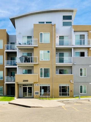 Photo 1: 2305 604 EAST LAKE Boulevard NE: Airdrie Apartment for sale : MLS®# A1238453