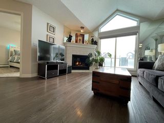 Photo 1: 405 10 Sierra Morena Mews SW in Calgary: Signal Hill Apartment for sale : MLS®# A2030186