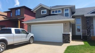 Photo 2: : Lacombe Semi Detached for sale : MLS®# A1190037