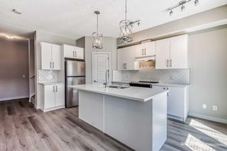 Photo 10: 712 32 red embers parade NE in Calgary: Redstone Row/Townhouse for sale : MLS®# A2060835
