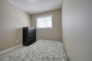 Photo 17: 555 Panatella Boulevard NW in Calgary: Panorama Hills Row/Townhouse for sale : MLS®# A2034434