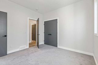 Photo 30: 418 24 Avenue NE in Calgary: Winston Heights/Mountview Semi Detached (Half Duplex) for sale : MLS®# A2126433