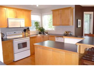 Photo 9: 11 FAIRWAYS Drive NW: Airdrie Residential Detached Single Family for sale : MLS®# C3476542