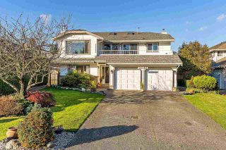Photo 1: 16163 8A Avenue in Surrey: King George Corridor House for sale in "McNally Creek" (South Surrey White Rock)  : MLS®# R2321441