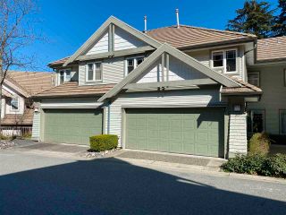 Photo 1: 30 2351 PARKWAY Boulevard in Coquitlam: Westwood Plateau Townhouse for sale in "WINDANCE" : MLS®# R2569780