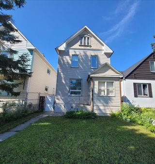 Photo 1: 704 Arlington Street in Winnipeg: West End Residential for sale (5A)  : MLS®# 202226747