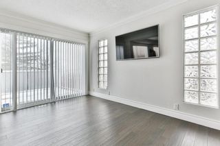 Photo 7: 103 COACH LIGHT Bay SW in Calgary: Coach Hill Detached for sale : MLS®# A1026742