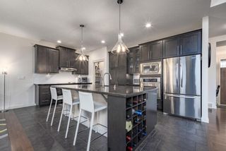 Photo 9: 129 Springbluff Boulevard SW in Calgary: Springbank Hill Detached for sale : MLS®# A2140786