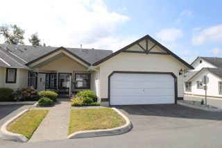 Photo 1: 85 19649 53 Avenue in Langley: Langley City Townhouse for sale in "Huntsfield Green" : MLS®# R2399090