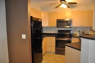 Photo 19: 1410 12 Cimarron Common: Okotoks Apartment for sale : MLS®# A2011167