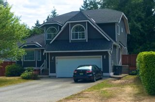Photo 1: 41387 DRYDEN Road in Squamish: Brackendale House for sale in "Eagle Run, Brackendale" : MLS®# R2800585