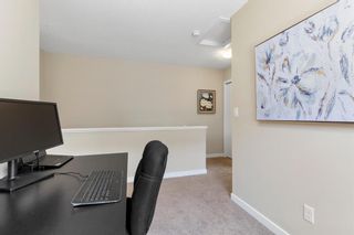 Photo 27: 201 501 River Heights Drive: Cochrane Row/Townhouse for sale : MLS®# A1250960