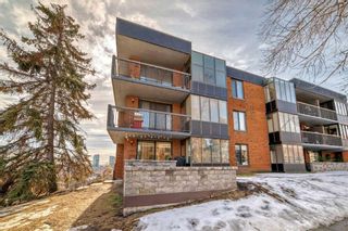 Main Photo: 107 345 4 Avenue NE in Calgary: Crescent Heights Apartment for sale : MLS®# A2116545