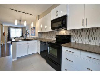 Photo 5: 312 ASCOT Circle SW in Calgary: Aspen Woods House for sale : MLS®# C4003191